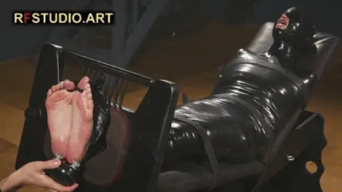 Brittany in Tight PVC Mummification Part 3 - Foot Tickling in Stocks (UHD 4K MP4)